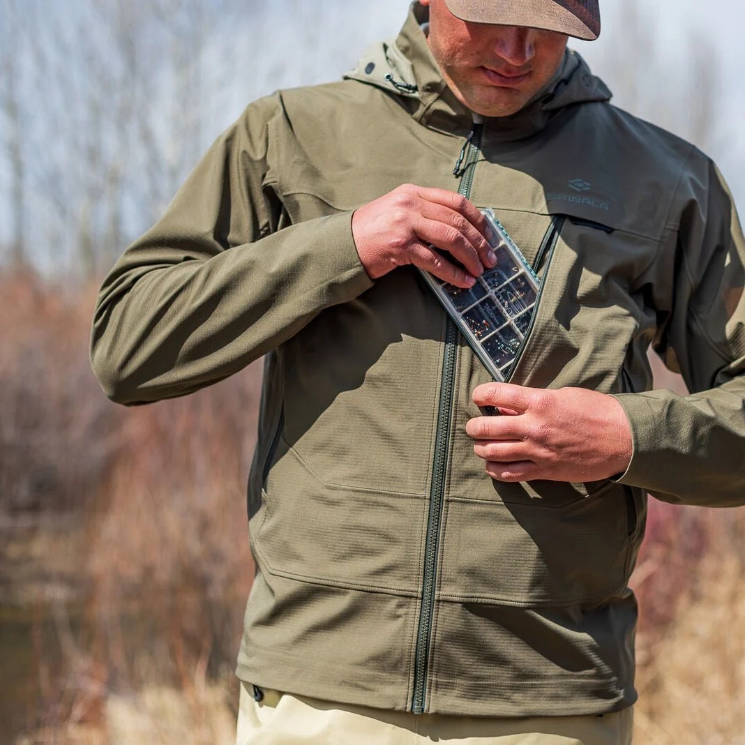 Skwala Backeddy softshell jacket chest pocket sized for fly boxes and fishing gear storage
