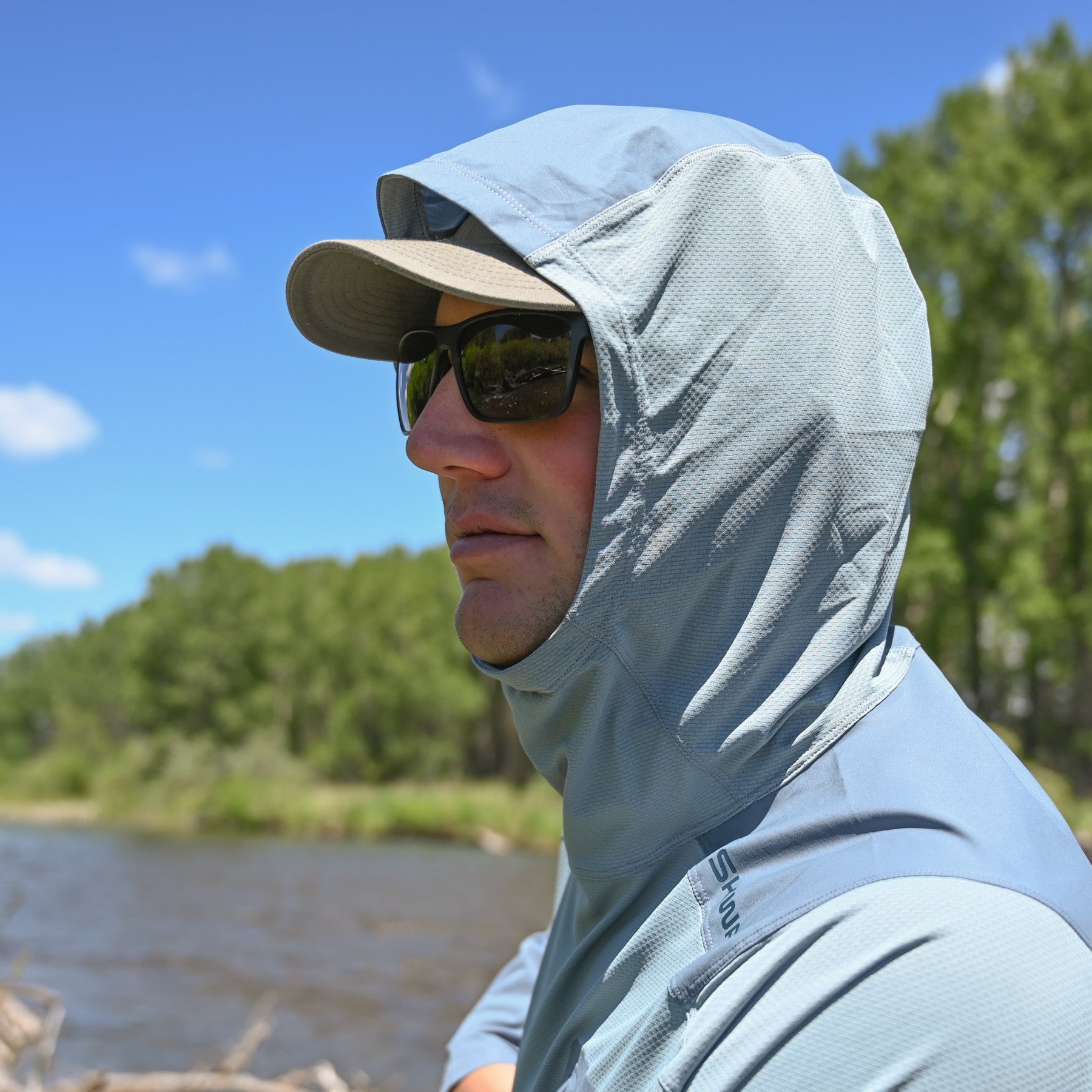 Skwala Sol Tactical Hoody scuba hood providing sun protection for fly fishing on bright summer day