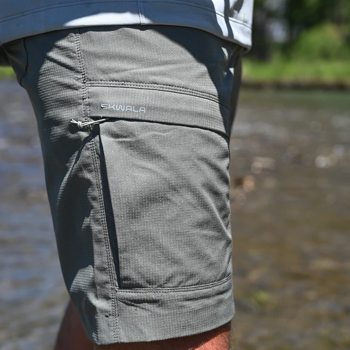 Side of Skwala Sol Shorts Charcoal color on angler in river