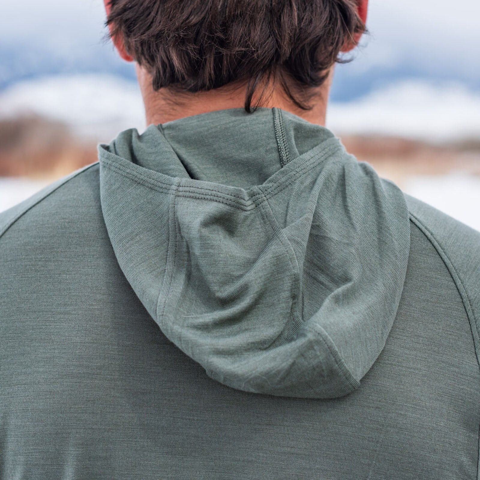 Back view of Skwala Thermo 150 Hoody lightweight Merino wool fly fishing sun hoody