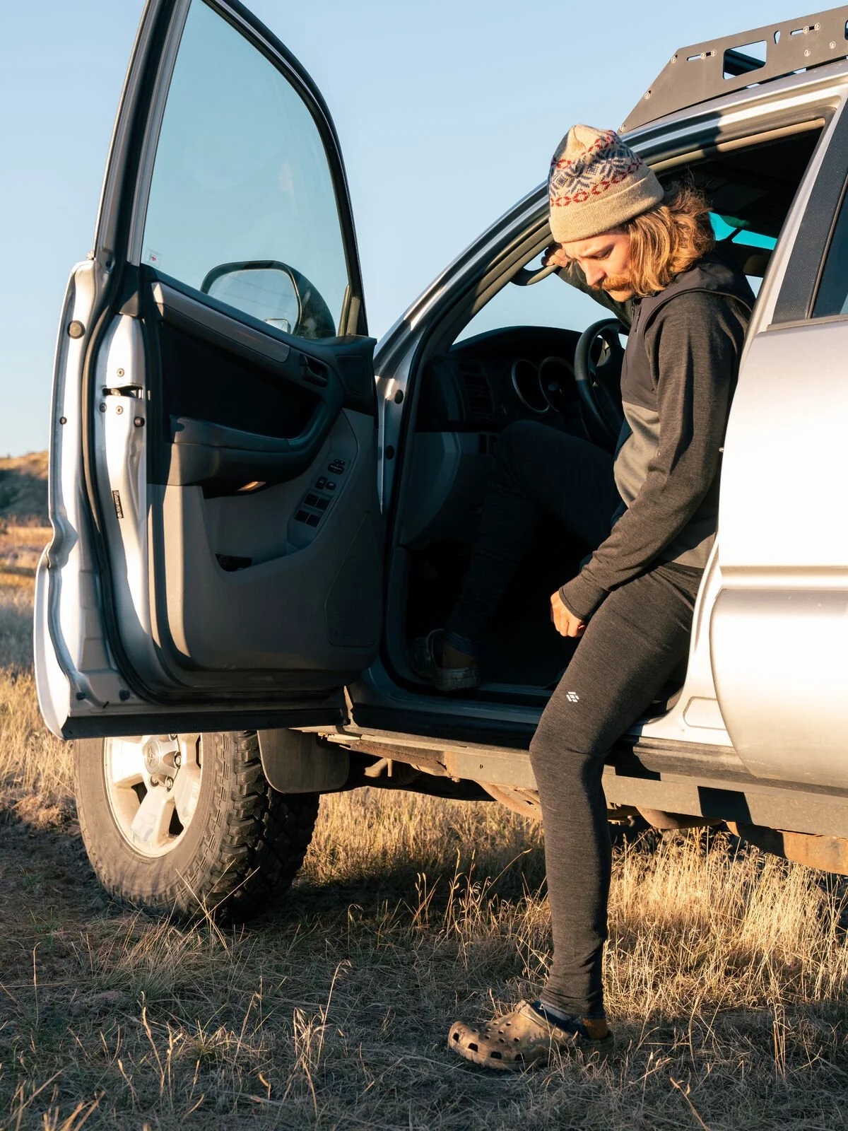 Angler wearing Skwala Thermo 260 Merino base layer pants before a cold weather fishing trip