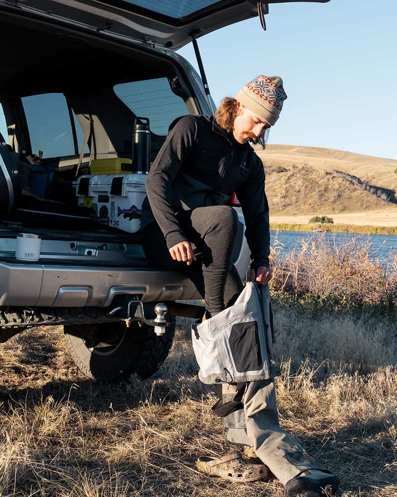 Men’s Merino fishing base layer bottoms for warmth and moisture control beneath waders