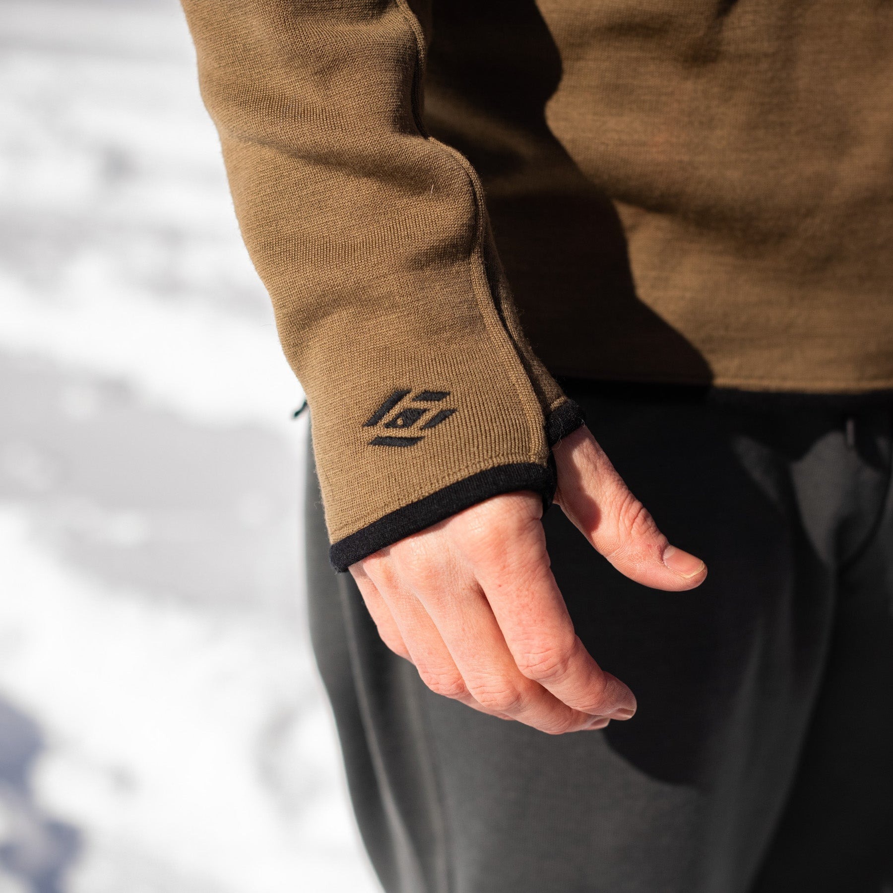 Close-up of Skwala Thermo 350 Hoody thumb loop cuff detail cold weather fly fishing base layer