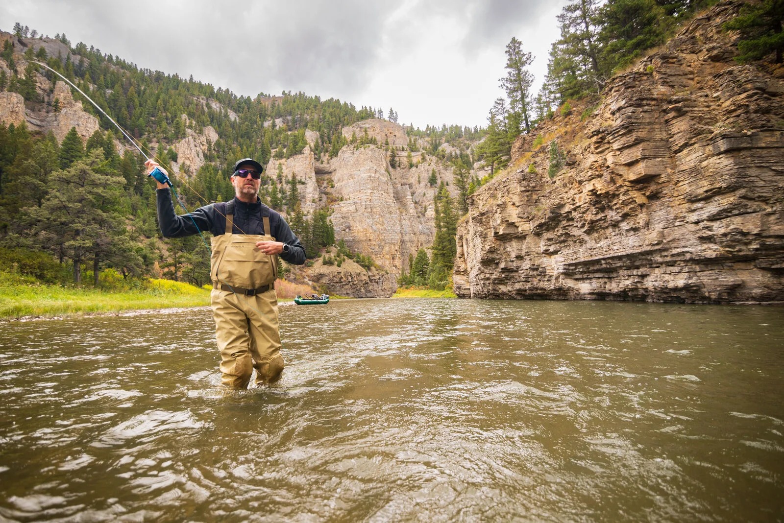 Skwala Backeddy Waders in use by a fly fisherman wading a rocky mountain river