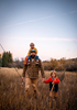 Man and kids walking to fish with Turtlebox Ranger Speaker.