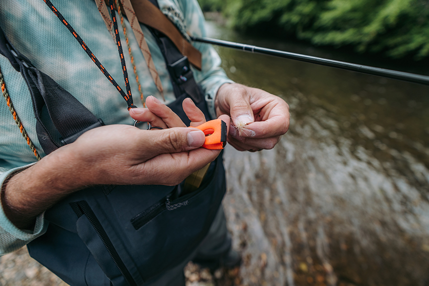 Fisherman on the river using  Umpqua's River Grip PS Big Nipper