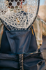 Fly fishing chest pack with net holder.
