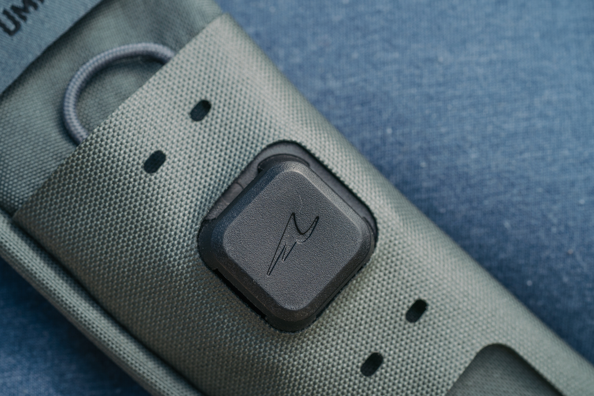 Umpqua magnetic base station mounted on fly fishing pack webbing real-world gear setup