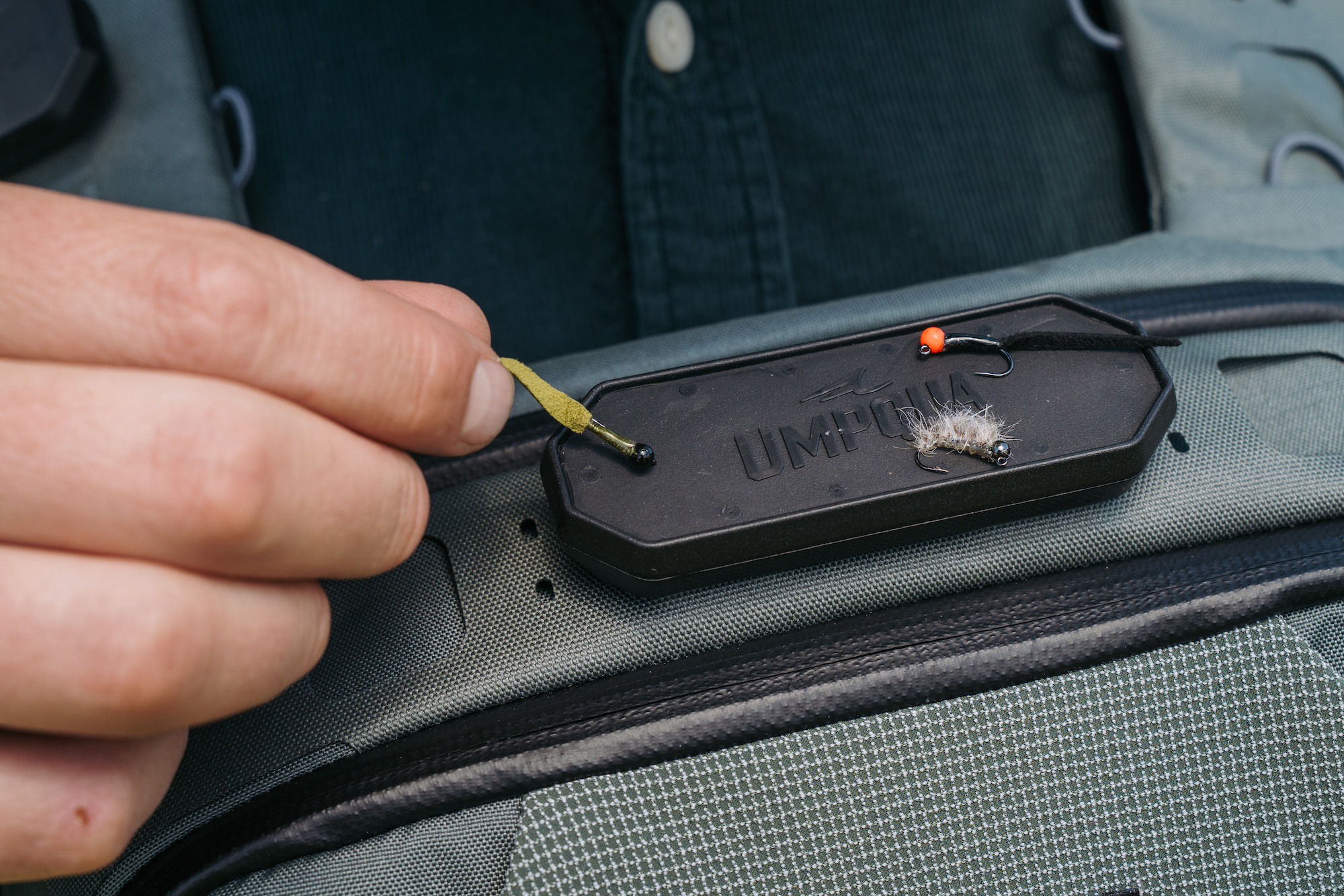 Umpqua HatchPad double mounted on fishing pack strap fly holder