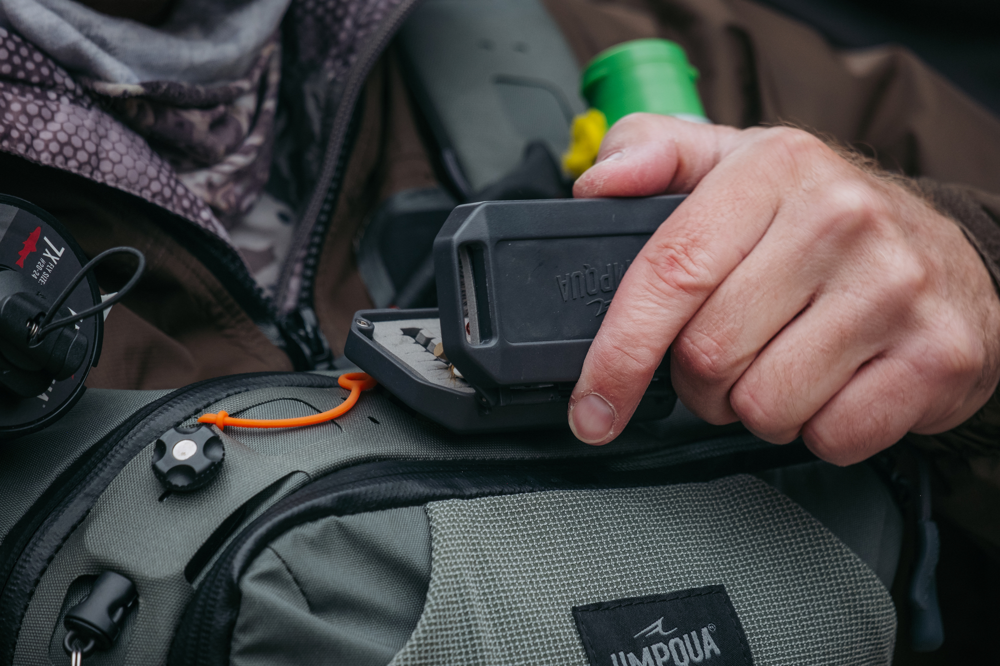 Umpqua LINK HatchVault in use on chest pack fly fishing gear quick access fly storage system