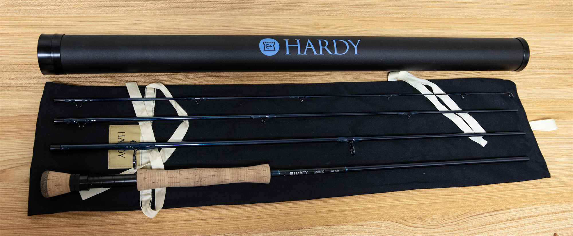 Full view of Used Hardy Zane Pro Sintrix 440 SWS 10wt 9'0" 4 Piece Fly Fishing Rod with rod tube