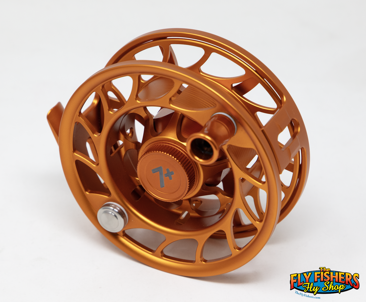 Spool side of Used Hatch Iconic 7+ Large Arbor Campfire Orange Fly Reel