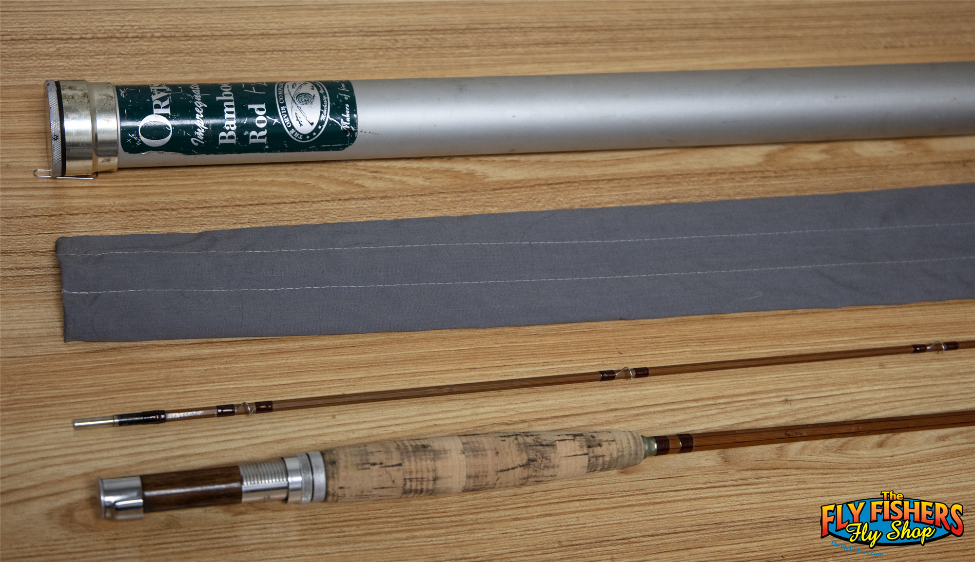 Used Orvis Impregnated Bamboo Madison 7'6" HDG 6wt 2 Piece Fly Fishing Rod with rod tube and sock.