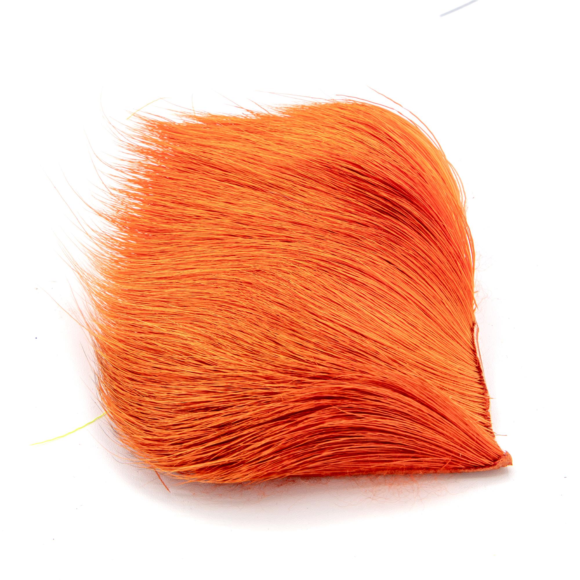 Blaze orange Varner deer belly hair patch for high-visibility topwater fly patterns