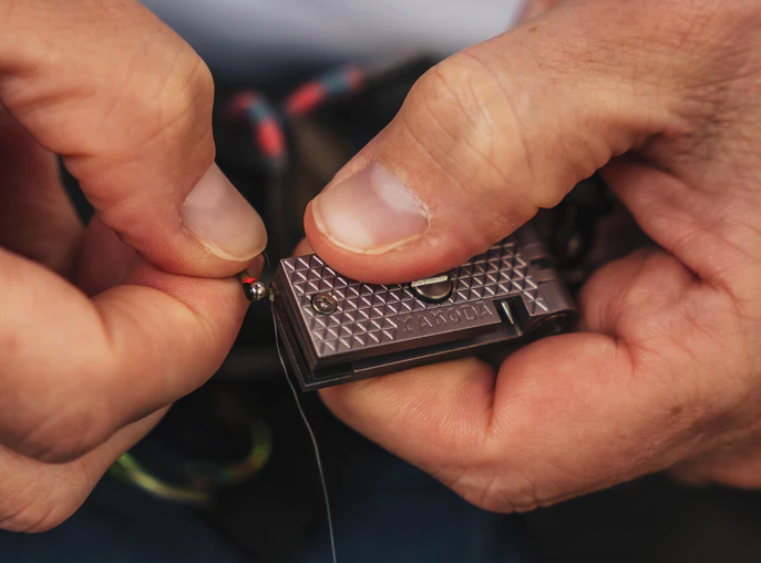 Angler cutting line with Yakoda Nippers