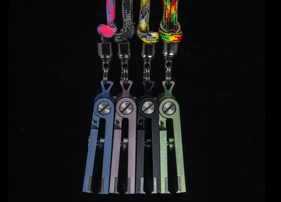 4 colors of Yakoda Nippers hanging on lanyards